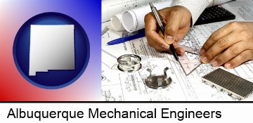 a mechanical engineer working on a blueprint in Albuquerque, NM