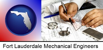 a mechanical engineer working on a blueprint in Fort Lauderdale, FL